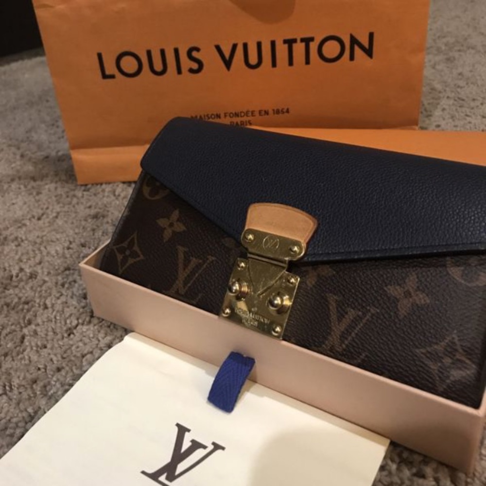 Louis Vuitton wallet with buckle